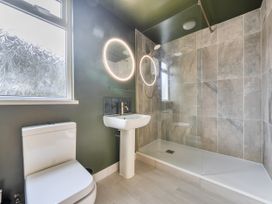 A bathroom with a shower and sink at 1 Bedroom Apartment Sleeps 2 Pets Welcome in Carbis Bay