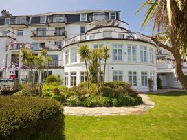 A building with balconies and gardens at 4 The Salcombe, Salcombe