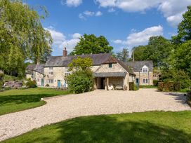 A house surrounded by garden and trees at French Mill in Shaftesbury