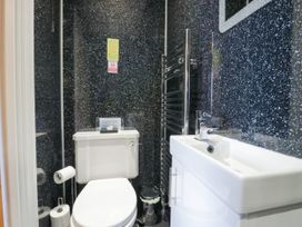 A bathroom with toilet and sink at Bramble near Cleator Moor