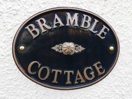 A nameplate indicating Bramble Cottage on a wall near Cleator Moor