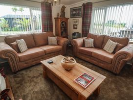 A living room with two sofas and a coffee table at The Hideaway at Monterey Helston