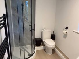 A bathroom with a shower and toilet at Truly Scrumptious in Yarm