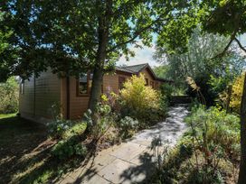 A house with pathway and greenery at Oak Lodge Battisford near Stowmarket