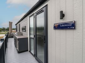 An outdoor area with a grill and countertop at Lodge 1 in St. Osyth