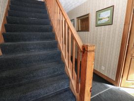 A staircase in a hallway at Prudhoe Cottage in Prudhoe