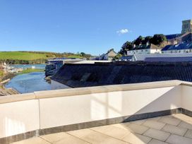 A view of buildings and water at Beachstone in Salcombe