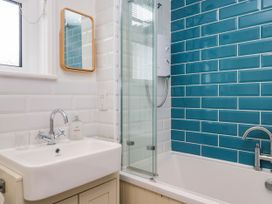 A bathroom with a sink and shower at Briargarth in Keswick