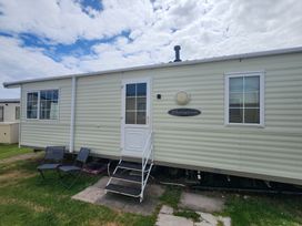 A caravan exterior with windows and steps at Whitley bay parkdean resorts - 52 Beechfield Whitley Bay
