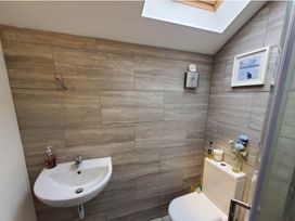 A bathroom with a sink and toilet at 3 Bedroom Cottage Hot Tub Garden Parking Dunkeswell