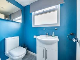 A bathroom with a sink and toilet at The Old Barn in Manchester