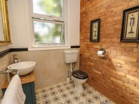 A bathroom with a sink and toilet at The Pines in Bournemouth
