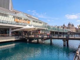 A building with a canopy and bridge at Princes Quay in Hull