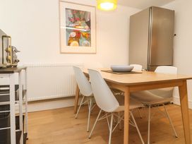 A dining room with a table and chairs at Top Deck in St. Ives