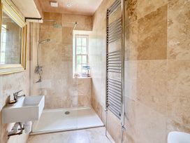 A bathroom with a shower and sink at Beautiful Pad Near World Heritage Jurassic Coast, Pymore near Bridport