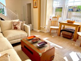 A living room with a coffee table and sofa at 5 Guests  2 Bedrooms  Free Parking 1min Beach Llandudno