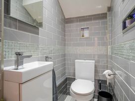 A bathroom with a sink and toilet at Detached House in Quiet Village Pets Allowed Ashbocking near Otley, Suffolk