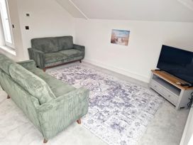 A living room with two sofas and a television at Apartment Sleeps 4 with Balcony and Parking in Kingsbridge