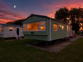 A green caravan at Billing Aquadrome Holiday Park 2bed Caravan Northampton