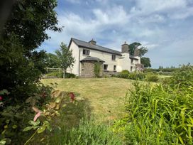 A house with a garden viewed from the outdoor area at 