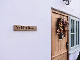 A door with a sign and wreath at Yr Hen Beudy Barn Conversion Sleeps 4 Dogs Ok, Broadle Farm near Llansteffan