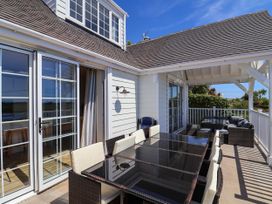 An outdoor seating area with table and chairs at 30 Southdown Avenue Weymouth