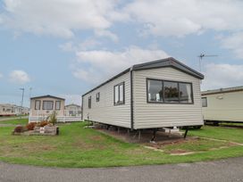 A mobile home in a park area at S7 Abergele