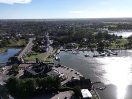 An aerial view of a marina with boats and surrounding area at The Mill House Apartment in Oulton Broad