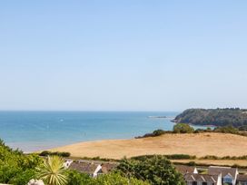 A view of a beach and ocean at Elberry Cove View in Paignton