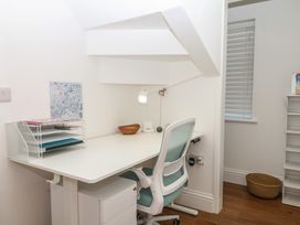 An office with a desk and chair at Elberry Cove View, Paignton