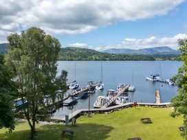 A marina with boats at Fir Tree Lodge, Coniston 3, White Cross Bay near Windermere