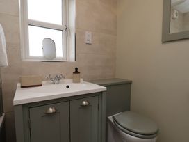 A bathroom with a sink and toilet at 64 Derwent Road in Whitby