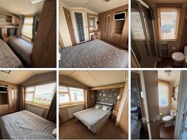 A bedroom with beds and furniture at Silversands Holiday Park, Indi’s Retreat at Silversands, Helston