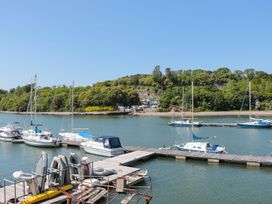 A marina with boats docked at Shipwrights in Brixham