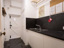 A kitchen with a sink and countertop at White Gables in Ambleside