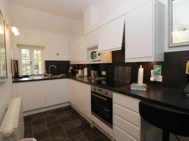 A kitchen with appliances and fixtures at White Gables in Grasmere