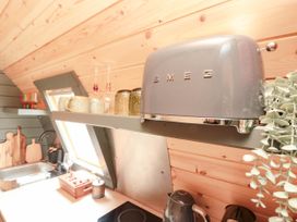 A kitchen with a toaster and kettle at Windy Ridge Lodge Egton