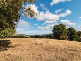 A landscape with trees and hills at Windy Ridge Lodge in Egton
