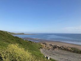 A coastal view with hills and water at Beautifully Presented 2 Bedroom Static Caravan in Monreith near Whithorn