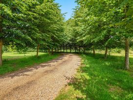 A pathway surrounded by trees at Barn Conversion Sleeps 2 with Parking, Diss