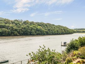 A view of a river with trees on the bank at 1 Bed Cottage - Sleeps 2 - Wifi, Malpas near Truro