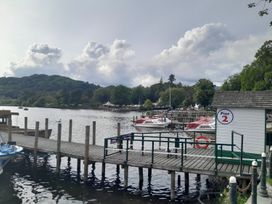 A dock with boats and pier at Pier 2 near a lake