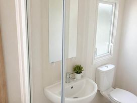 A bathroom with a sink and toilet at Billing Aquadrome Holiday Park - 2 Bedroom, Silver, Northampton
