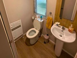 A bathroom with a toilet and sink at Billing Aquadrome Holiday Park - 2 Bedroom, Silver in Northampton