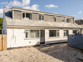 An outdoor view of a house with windows and door at 1 Bedroom Apartment, sleeping 3 with balcony and pet friendly, Carbis Bay