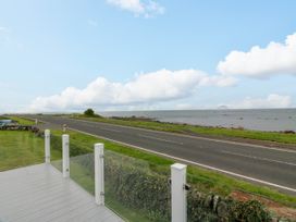 A view of the sea and road at Caravan in Girvan