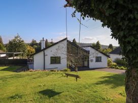 A house with a swing in the garden at 10 Rayrigg Rise Bowness-On-Windermere
