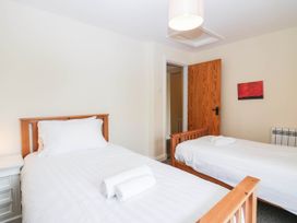 A bedroom with two beds at Holly in Cleator