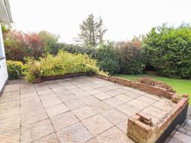 An outdoor area with paving stones and plants at Cross Beg in Kilmihil, County Clare