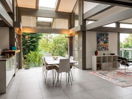 A dining room with a table and chairs at Two Hoots Littleworth